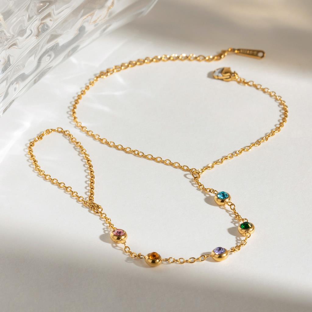 Multi Cubic Zirconia Detail Hand Chain in Gold | White Leaf