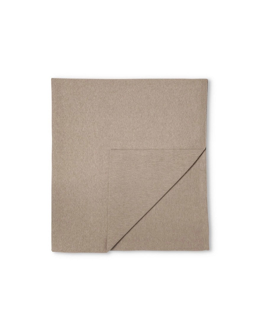 beige blanket throw
