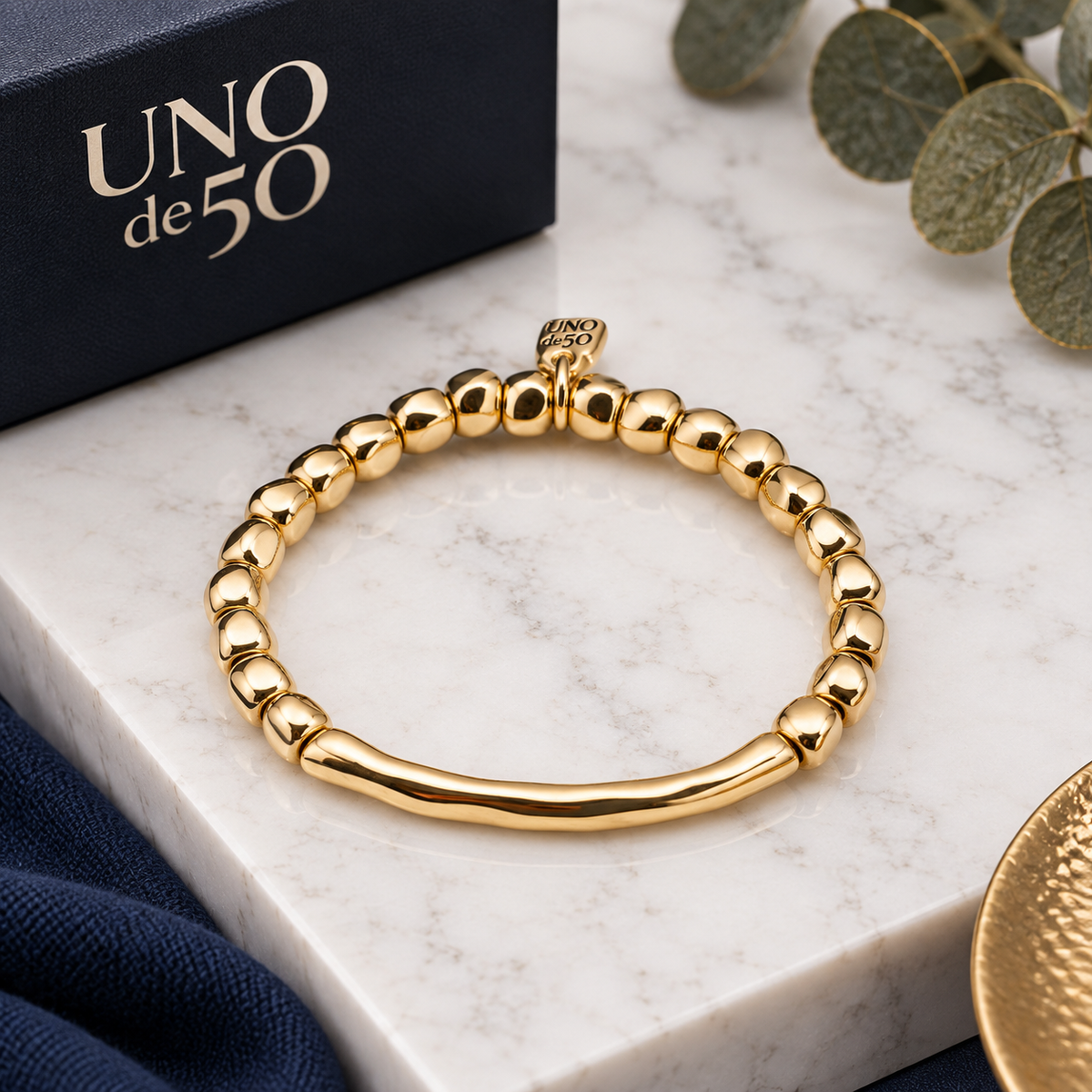 UNOde50 Gold Beaded Stretch Bracelet with Tubular Piece – PUL1208